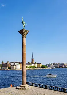 Stockholm County Prints: Engelbrekt Engelbrektsson Monument in the City Hall Garden with Riddarholmen Islet in the background