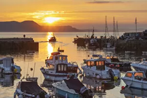England, Dorset, Lyme Regis, The Harbour at Sunrise