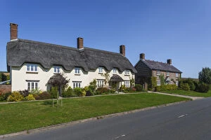 England, Dorset, Tolpuddle, Row of Thatched Roof Houses