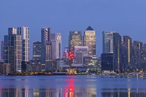 Images Dated 23rd July 2020: England, London, Docklands, River Thames and Canary Wharf Skyline at Night