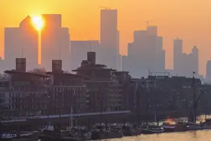 Thames Prints: England, London, Docklands, River Thames and Canary Wharf Skyline at Dawn