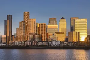 Offices Prints: England, London, Docklands, River Thames and Warm Early Morning Light on The Modern Canary Wharf Skyline