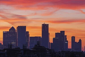 Images Dated 21st October 2019: England, London, Docklands, Silouette of Canary Wharf Skyline at Dawn