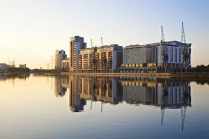 Images Dated 22nd October 2009: England, London, Hotels and appartment buildings reflecting in Royal Victoria Docks