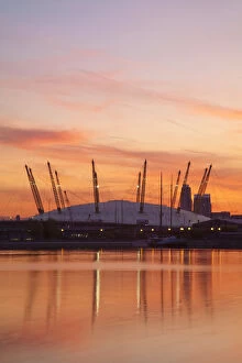 England, London, Newham, O2 Arena reflecting in Royal Victoria Docks