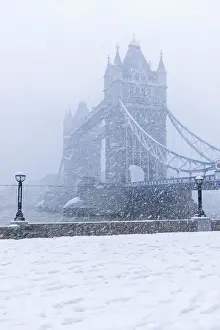 England, London, Southwark, Tower Bridge and Potters Field in the Snow