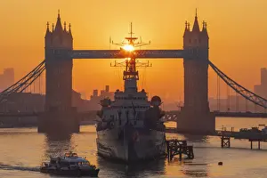 England, London, Tower Bridge and Museum Ship HMS Belfast at Sunrise