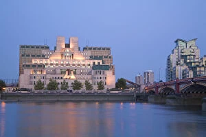 England, London, Vauxhall, MI6 Building reflecting in Thames river