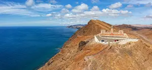 Las Palmas Prints: Entallada lighthouse in between desert landscape and the blue Atlantic Ocean