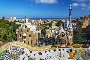 World Heritage Site Gallery: Entrance of Park Guell with city skyline behind, Barcelona, Catalonia, Spain
