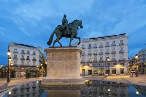 Historical Landmark Prints: Equestrian statue of Carlos III of Spain at Puerta del Sol Square at twilight, Madrid