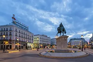 Historical Landmark Prints: Equestrian statue of Carlos III of Spain at Puerta del Sol Square at twilight, Madrid