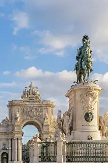 Equestrian Statue Prints: Equestrian Statue of King Jose I with The Arco da Rua Augusta in the background in Praca do Comercio