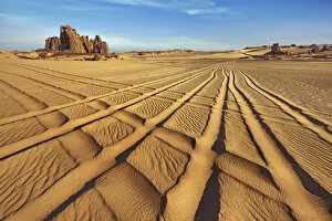 Sand Dune Gallery: Erosion landscape in Tassili du Hoggar with car traces - Algeria, Tassili Hoggar
