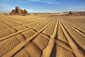 Algeria Prints: Erosion landscape in Tassili du Hoggar with car traces - Algeria, Tassili Hoggar