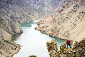 Images Dated 6th August 2014: Europe, Croatia, Dalmatia, Zadar region, a photographer standing over the Zrmanja Canyon
