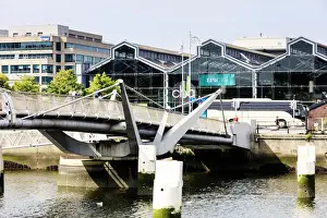 Half Penny Bridge Prints: Europe, Dublin, Ireland, Footpath bridge on the Liffey river with EPIC (Irish Emigration