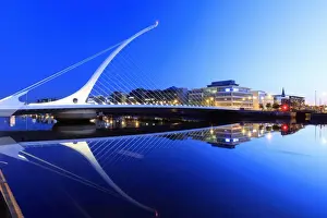 Architecture Prints: Europe, Dublin, Ireland, Samuel Beckett bridge by night reflecting on the Liffey river