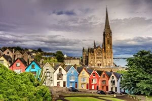 Europe, European, Ireland, Northern Europe; Cobh Cathedral and houses at sunset