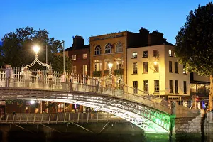 Europe, European, Western Europe, Europe; Dublin, Halfpenny bridge and Liffey river