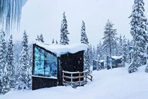 Snowfall Collection: Europe, Finland, a luxury resort cabin in the forest near Ruka