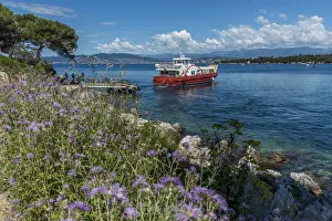 Cannes Prints: Europe, France, Cote D Azur. The ferry boat departing from Ile Saint-Honorat back