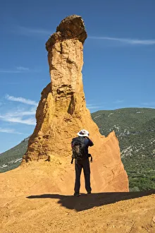 Images Dated 15th September 2016: Europe, France, Provence, Rustrel, Le Colorado Provencal, Man taking a picture of