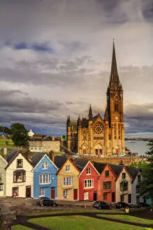 Europe, Ireland, Cobh Cathedral and houses at sunset