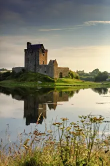 Dunguaire Prints: Europe, Ireland, Dunguaire castle at sunrise in Kinvara village reflecting in