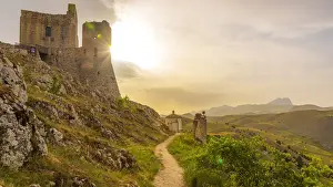 europe, Italy, the Abruzzi. Rocca Calascio at sunset with dramatic clouds building up