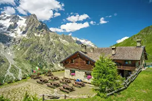 Aosta Prints: Europe, Italy, Aosta Valley. The mountain hut Rifugio Bonatti on the TMB hike in front of the Mont Blanc Massif