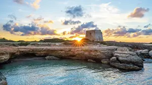 Europe, Italy, Apulia. Sunset at the beach of Torre Pozzella near Ostuni