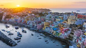 Europe, Italy, Campania. The Marina Corricella of Procida island at sunset