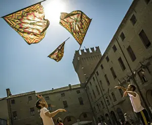 Europe, Italy, Emilia-Romagna. flag swingers of Ferrara