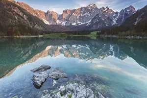 Upper Lake Prints: Europe, Italy, Friuli Venezia Giulia. Sunset at the Fusine upper lake with the Mangart
