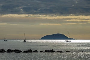 Europe, Italy, the gulf of La Spezia. Sailing boat at sunset