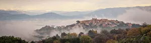 Images Dated 2nd March 2023: Europe, Italy, Latium. On a hiking path from Frascati watching the town of Monte Porzio Catone in