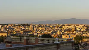 europe, Italy, Latium. Rome, the city at sunset seen from a terrace above Trastevere near