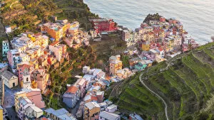 Images Dated 19th March 2020: Europe, Italy, Liguria, Cinque Terre. View over Manarola at Sunset