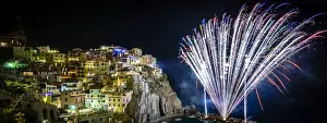Europe, Italy, Liguria. Fireworks in Manarola for San Lorenzo