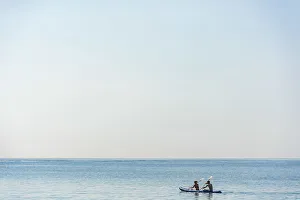 Riomaggiore Prints: Europe, Italy, Liguria. Paddling a canoe in Monterosso, Cinque Terre