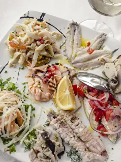 Marches Prints: Europe, Italy, Marches. Mixed seafood platter for starter in a local restaurant