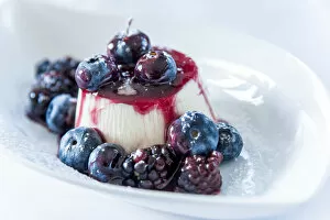 Images Dated 18th November 2016: Europe, Italy. Panna cotta with berries
