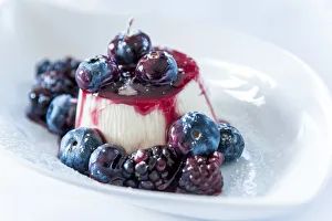 Images Dated 18th November 2016: Europe, Italy. Panna cotta with berries