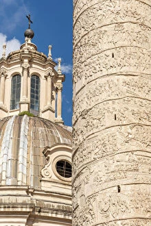 Archeological Site Gallery: Europe, Italy, Rome. Close up of the Trajans column with the cupola of the church