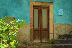 Europe, Italy, Sardinia. Bosa, colorful entrance to a house
