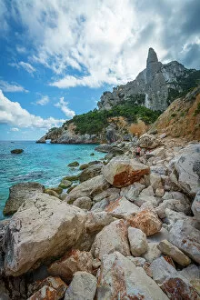 Images Dated 10th November 2022: Europe, Italy, Sardinia. Cala Goloritze, the beach, the needle and the arch