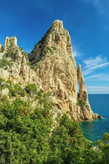 Trekking Prints: Europe, Italy, Sardinia. the caracteristic rock needle Pedra Longa