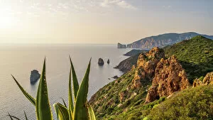 March Gallery: Europe, Italy, Sardinia. The rocky coast near Nebida and the Pan di Zucchero seen from