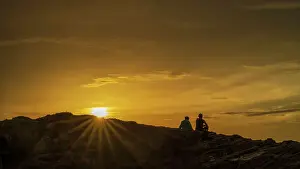 Backlight Prints: Europe, Italy, Sardinia. Sunset on a rock near to the beach Is Arutas
